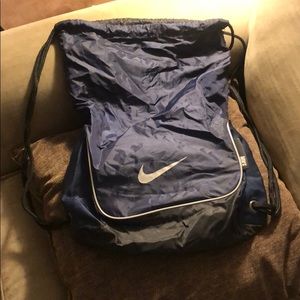Black and blue nike drawstring bag